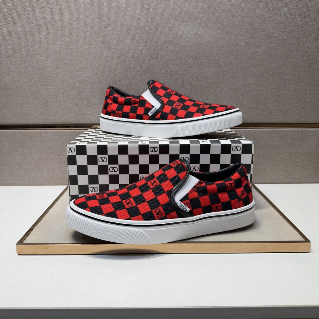 Vans Red and Black Checkerboard Slip-On Sneakers — front