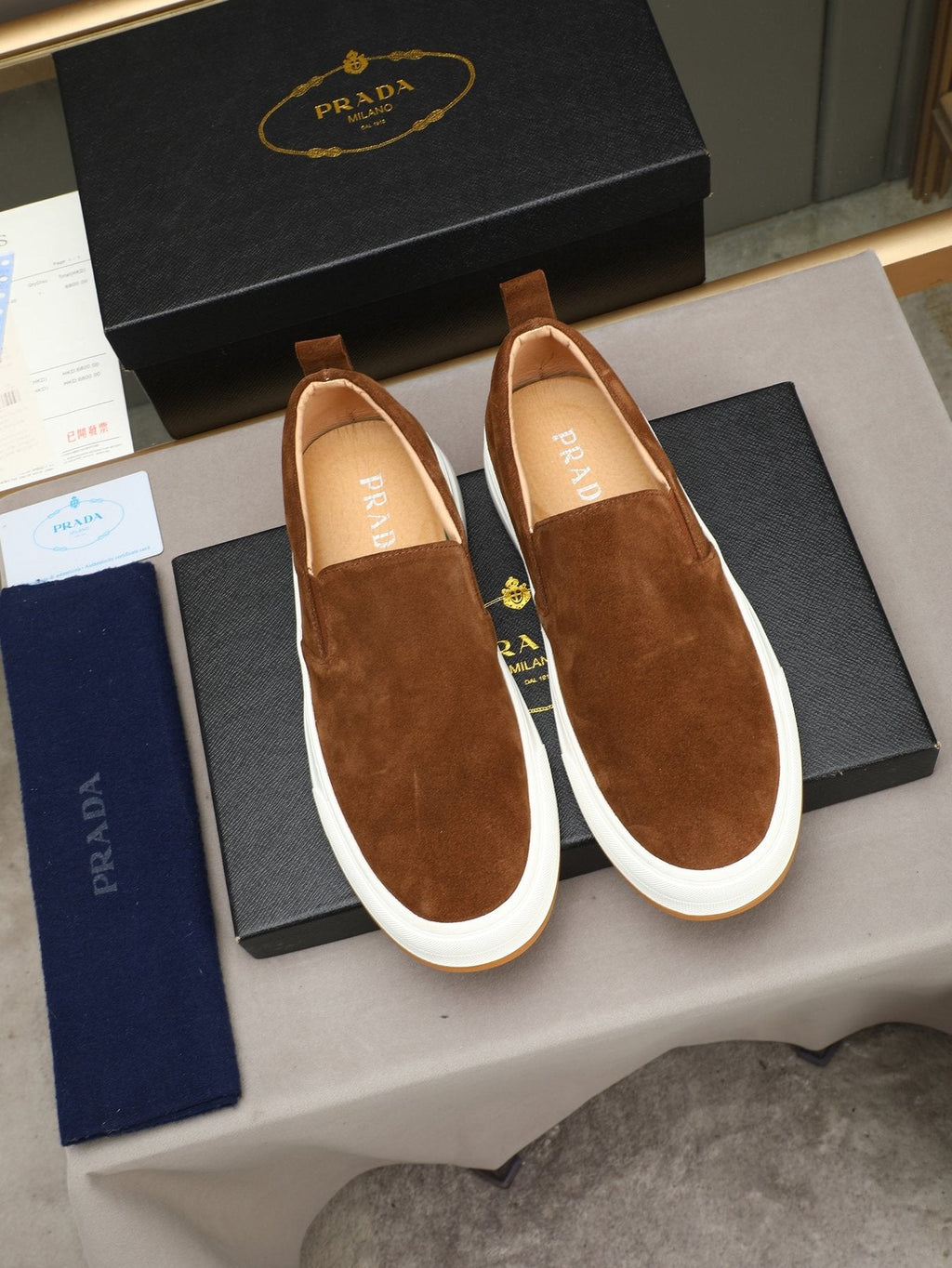 Prada Leather Slip-On Sneakers — front