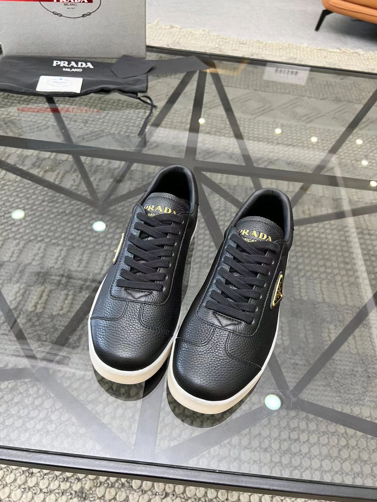 Prada Gold Accent Low-Top Sneakers — front