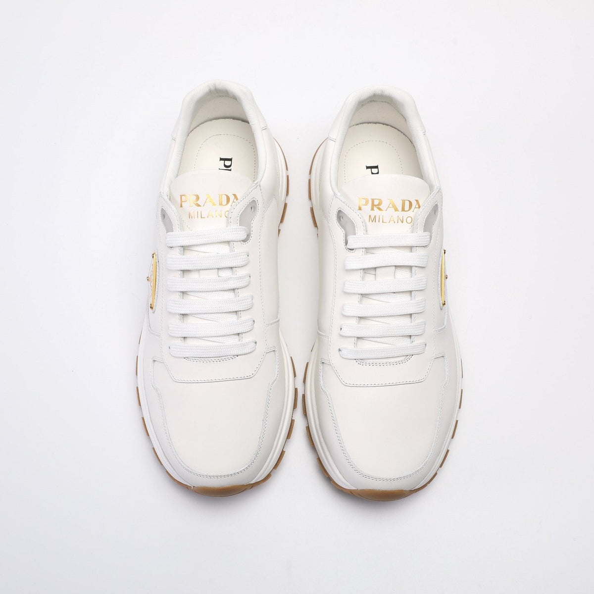 Prada Triangle Badge Low-Top Sneakers — front